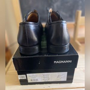MAGNANI used handful of times. Size 10.5, black